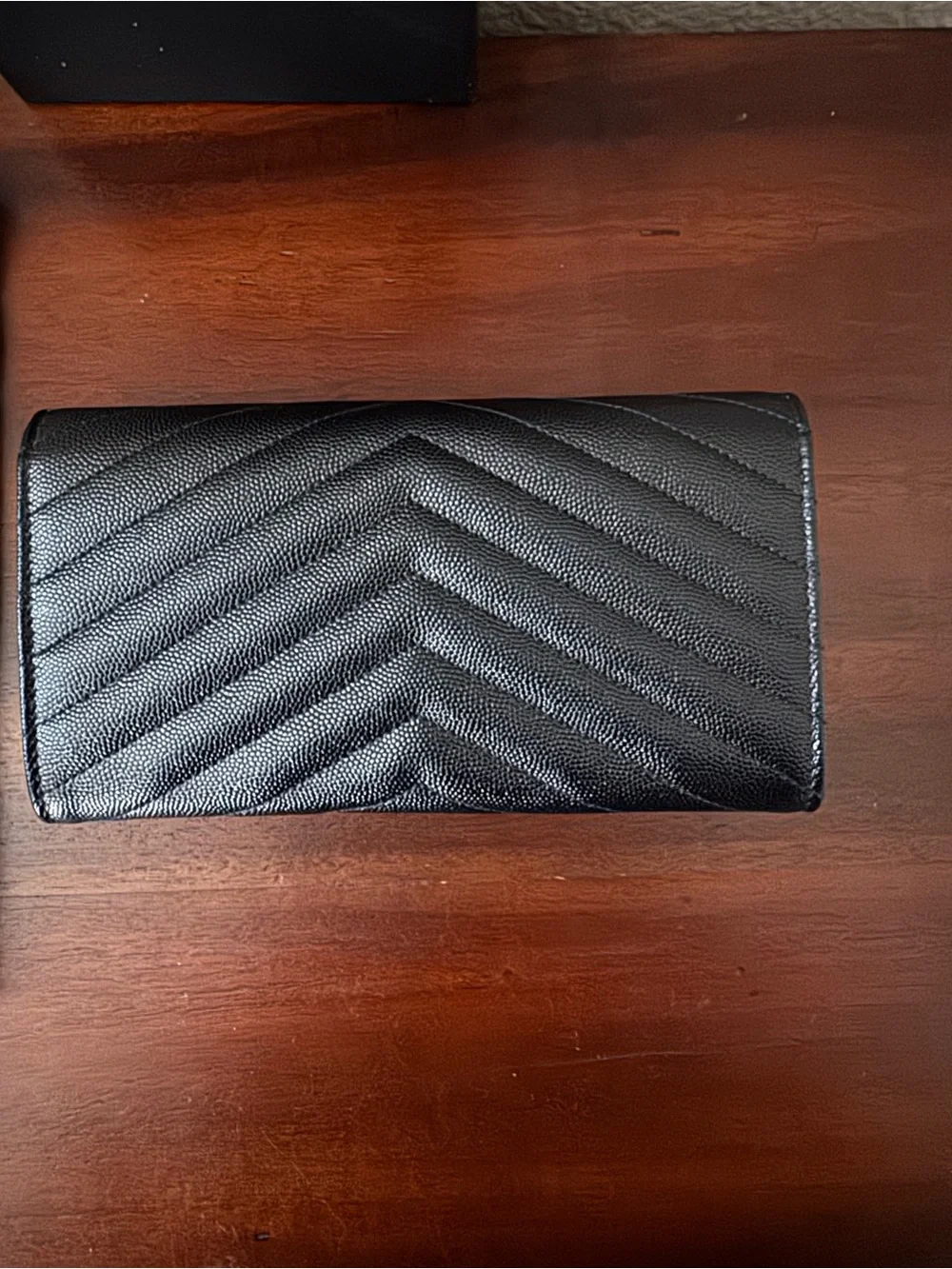 Saint Laurent Cassandre YSL Monogram Large Flap Wallet in grained leather